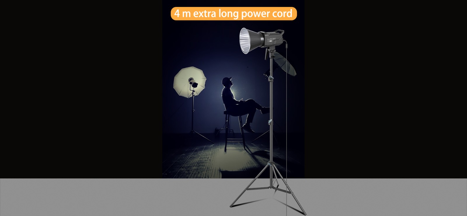 LUXCEO SL100D LED video light set up in a studio setting. It comes with an extra long 4-meter power cord, providing freedom and flexibility.